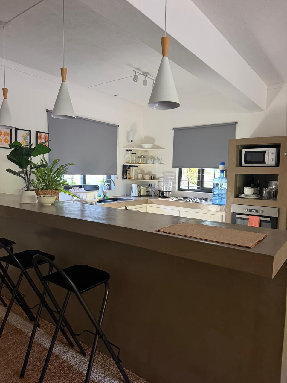 Stylish 4-Bedroom Home with Garden and Pool in Central Black River — image 4